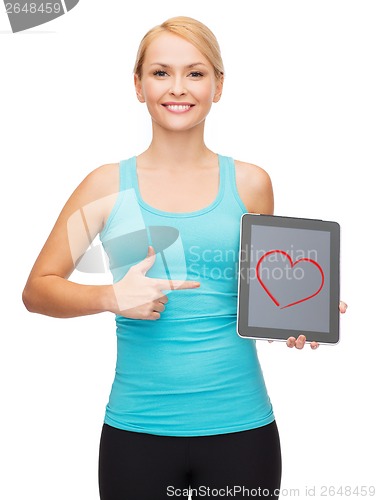 Image of sporty woman with tablet pc blank screen