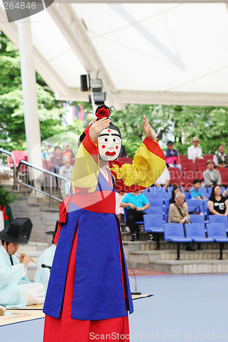 Image of Person in traditional South Korean costume and mask