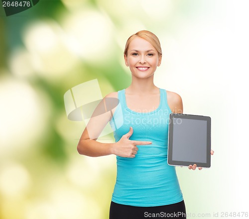 Image of sporty woman with tablet pc blank screen