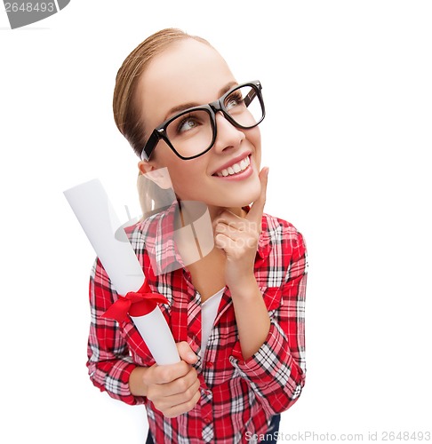 Image of smiling woman in black eyeglasses with diploma