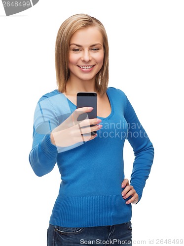 Image of woman taking self picture with smartphone camera