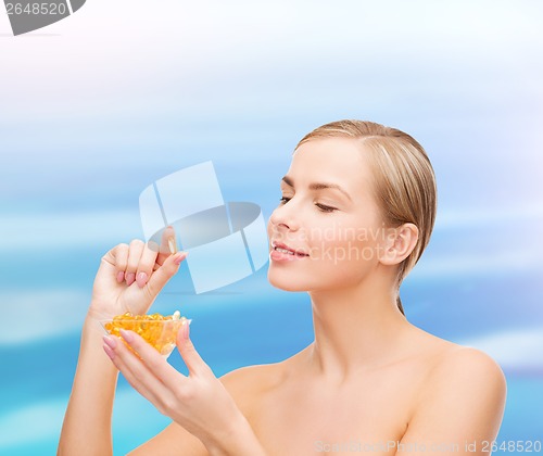 Image of lovely woman with omega 3 vitamins