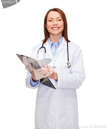 Image of smiling female doctor with clipboard