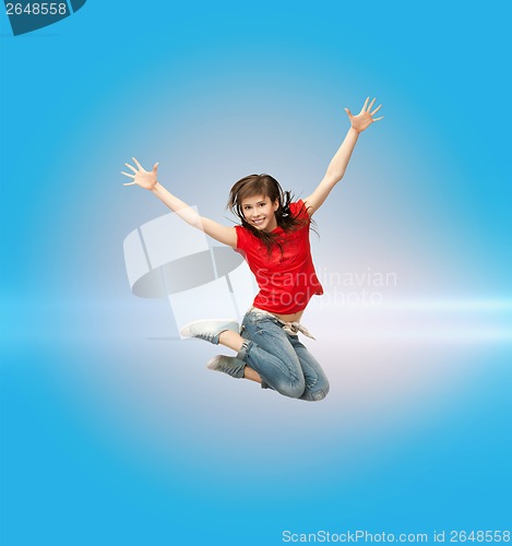 Image of smiling girl jumping