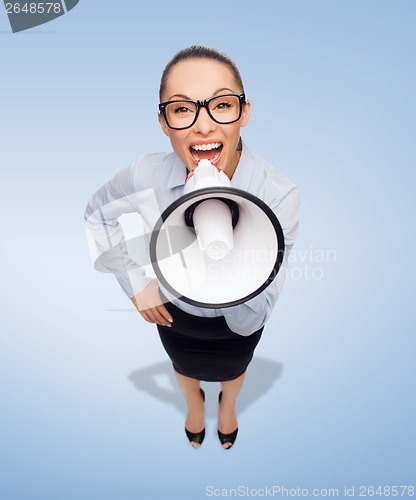 Image of screaming businesswoman with megaphone