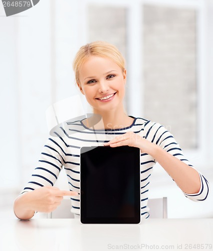 Image of smiling teenage girl with blank tablet pc screen