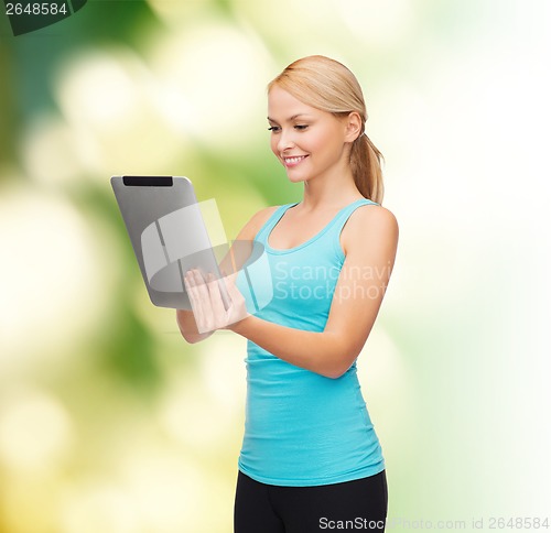 Image of sporty woman with tablet pc