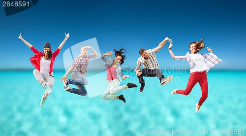 Image of group of teenagers jumping