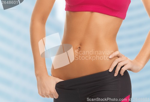 Image of woman trained abs