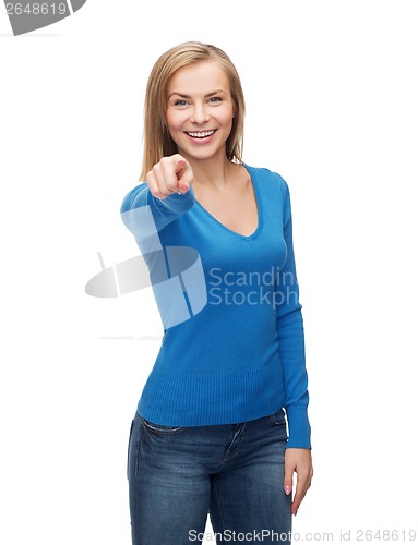 Image of smiling student pointing finger at you