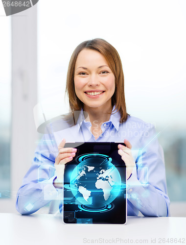 Image of smiling businesswoman with tablet pc computer