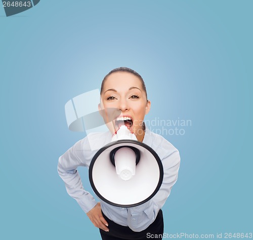 Image of screaming businesswoman with megaphone