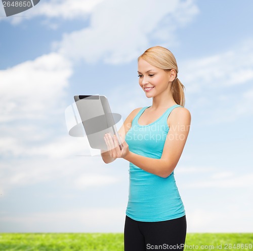 Image of sporty woman with tablet pc