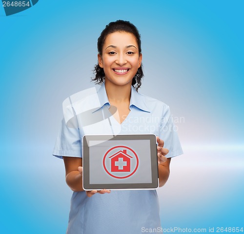 Image of smiling female doctor or nurse with tablet pc