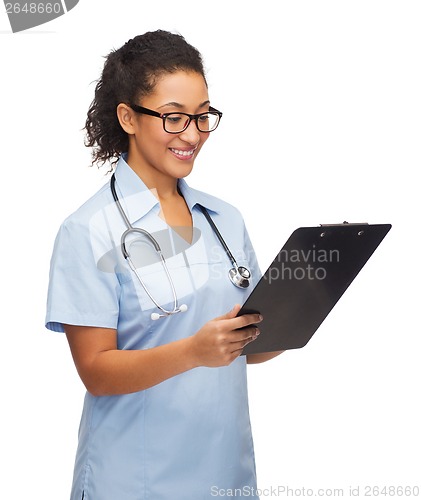 Image of smiling female african american doctor or nurse