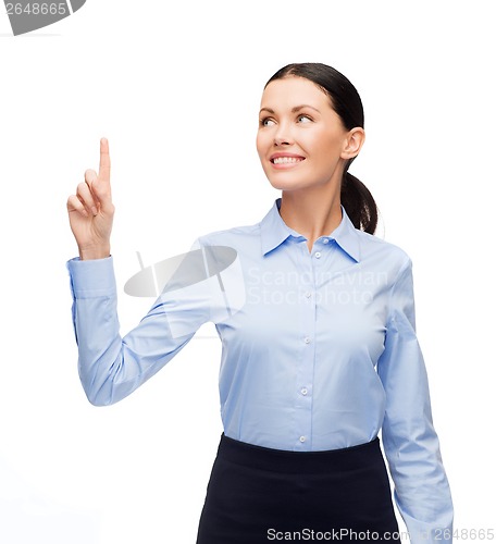 Image of smiling woman with her finger up