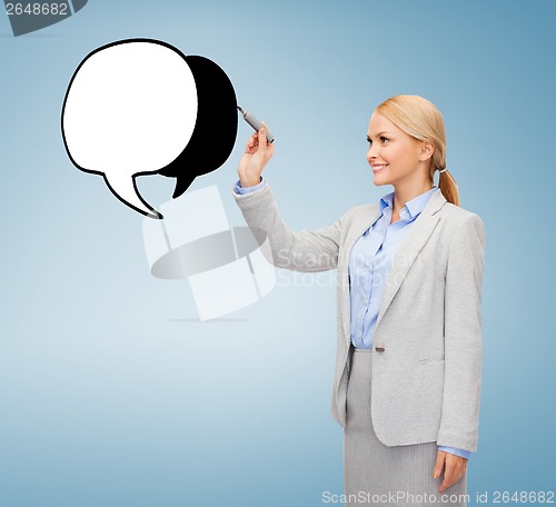 Image of businesswoman drawing text bubble