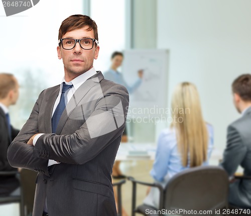 Image of attractive buisnessman or teacher in glasses