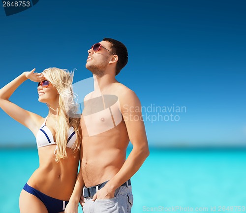 Image of beautiful couple on the beach