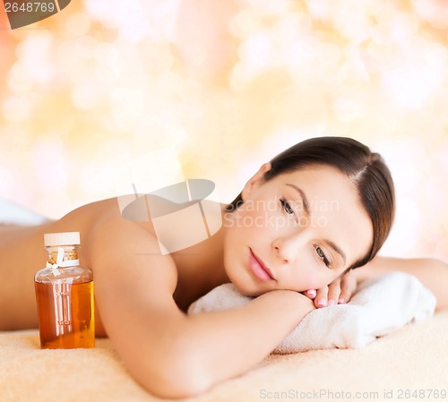 Image of happy woman in spa salon