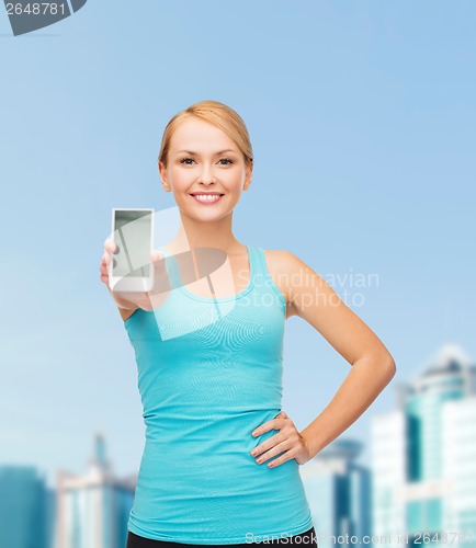 Image of sporty woman with smartphone