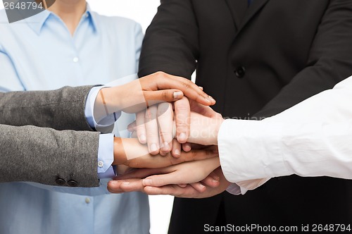 Image of group of businesspeople celebrating victory