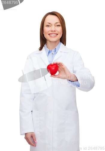 Image of smiling female doctor with heart
