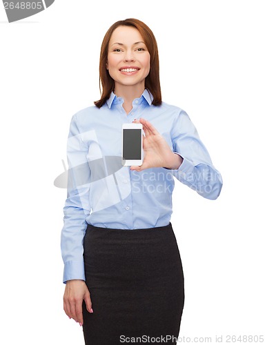 Image of smiling businesswoman with smartphone blank screen