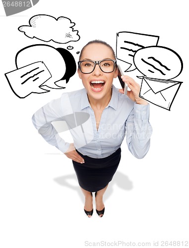 Image of happy businesswoman in eyeglasses with smartphone