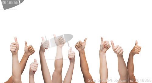 Image of human hands showing thumbs up