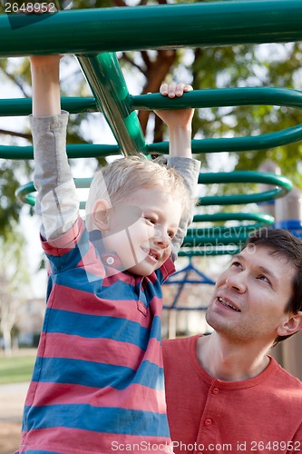Image of family at the playground