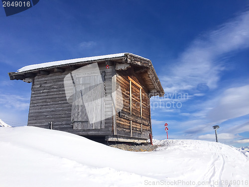 Image of Old wooden barn in a sunny day