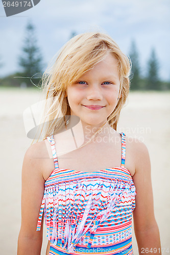 Image of Young cute girl at the beach
