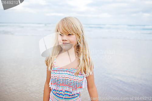 Image of Cute young girl at beach