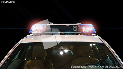 Image of Flash lights and siren on the police car