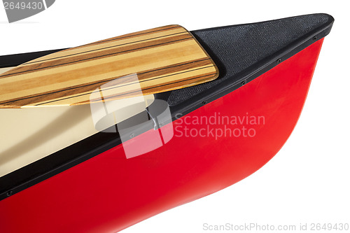 Image of canoe bow with a paddle