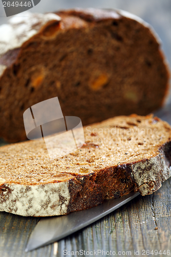 Image of Rye bread with dried apricots close-up.