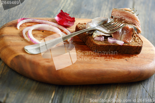 Image of Fork with anchovies.