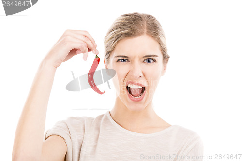 Image of Beautiful woman holding a red chilli pepper