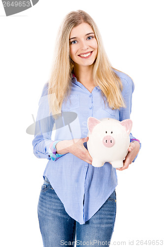 Image of Beautiful woman holding  a piggy bank