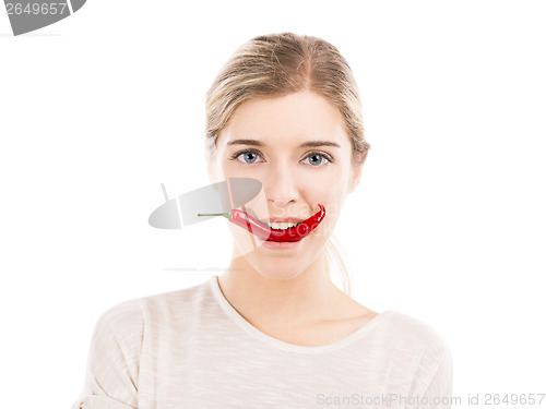 Image of Beaitiful woman holding red tomatos