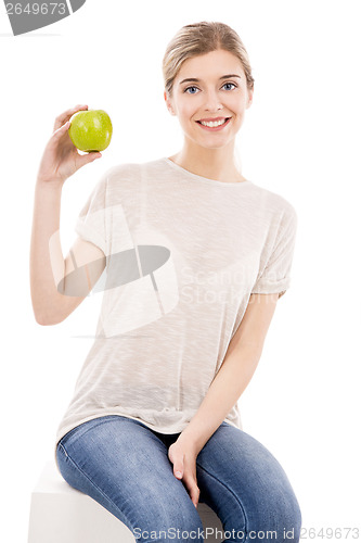 Image of Beautiful woman with a green apple