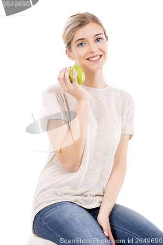Image of Beautiful woman with a green apple