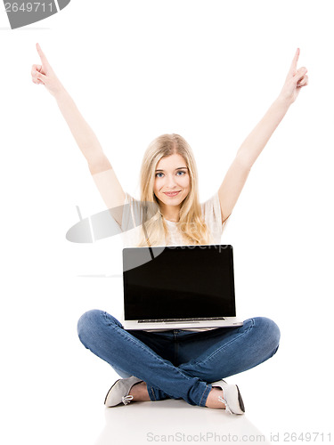 Image of Woman working on a laptop