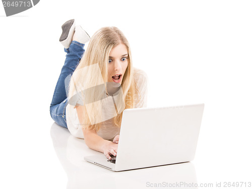 Image of Woman working on a laptop