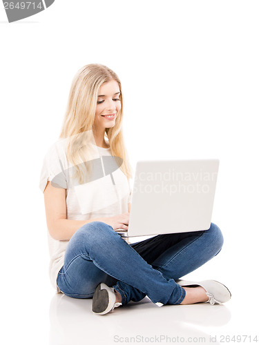 Image of Woman working on a laptop