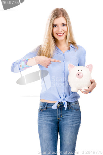 Image of Woman pointing to a piggy bank