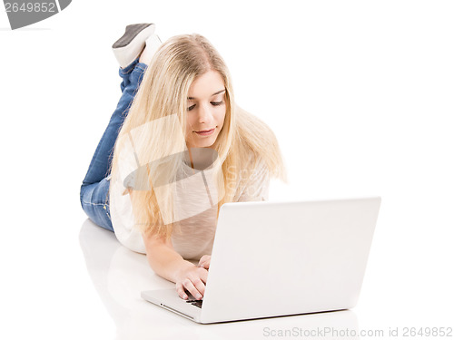 Image of Woman working on a laptop