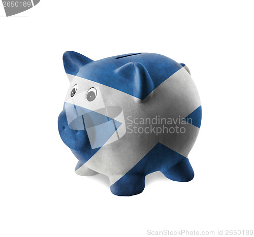 Image of Ceramic piggy bank with painting of national flag 