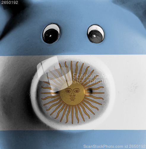 Image of Ceramic piggy bank with painting of national flag 